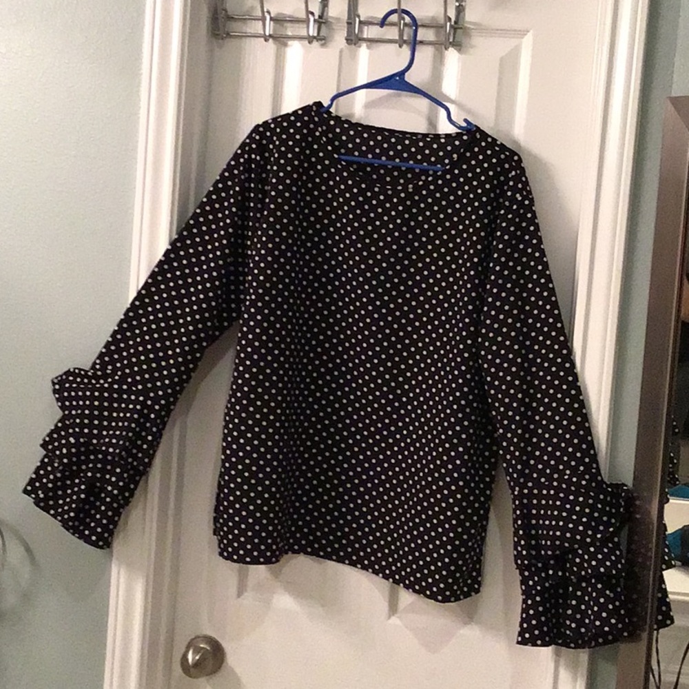Polka dot blouse with bell sleeves